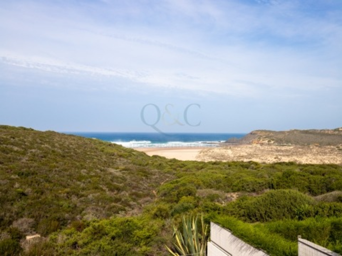 A rare opportunity to buy a house overlooking praia da amoreia.